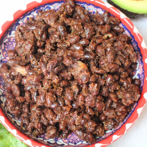 Pressure cooker spiced vegan black beans are ready to eat.