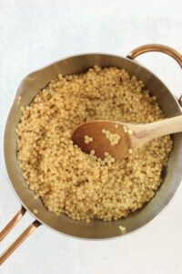 Cooking couscous in a saucepan.