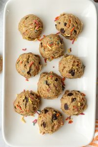 The protein balls have been added to a white dish.