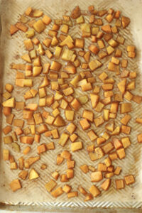 Roasted butternut squash on a pan.