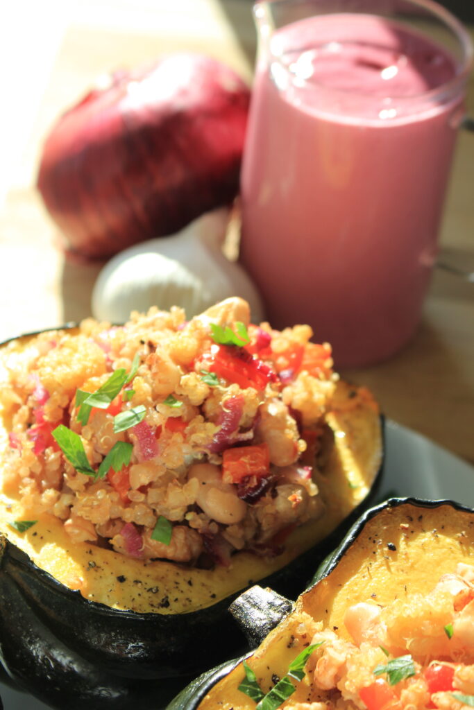 Stuffed Acorn Squash with a drizzle of the walnut-cranberry sauce..