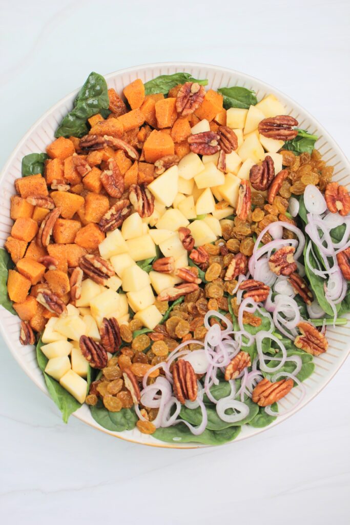 A fall salad with the roasted butternut squash.