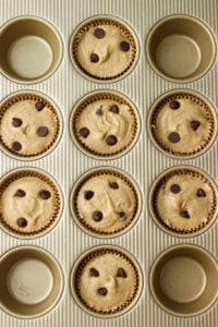 The batter has been scooped into the muffin tin and is ready to bake.