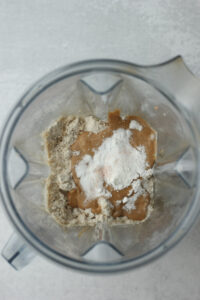 All of the ingredients have been added to a blender.