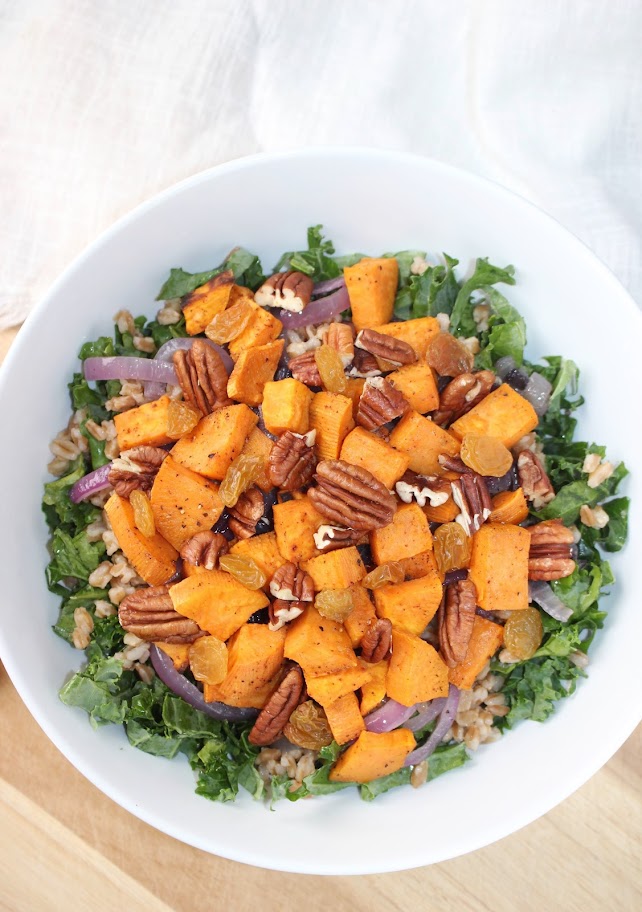 kale and sweet potato salad in a bowl ready to eat.