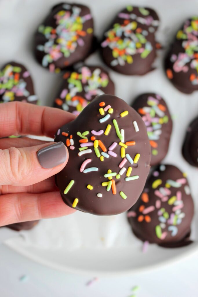 Holding a Healthy Peanut Butter Egg.