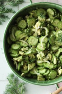 The salad has been tossed and is ready to eat.