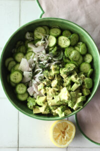 All of the wet ingredients have been added to the salad bowl.