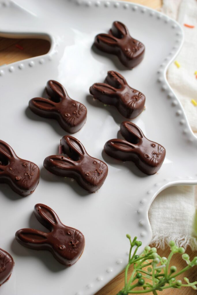 Homemade Peanut Butter Chocolates for Easter are on a plate and are ready to serve.