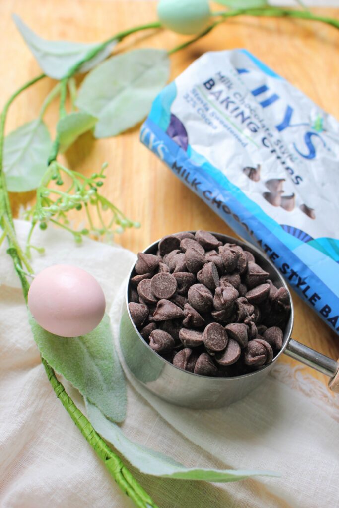A cup full of chocolate chips.