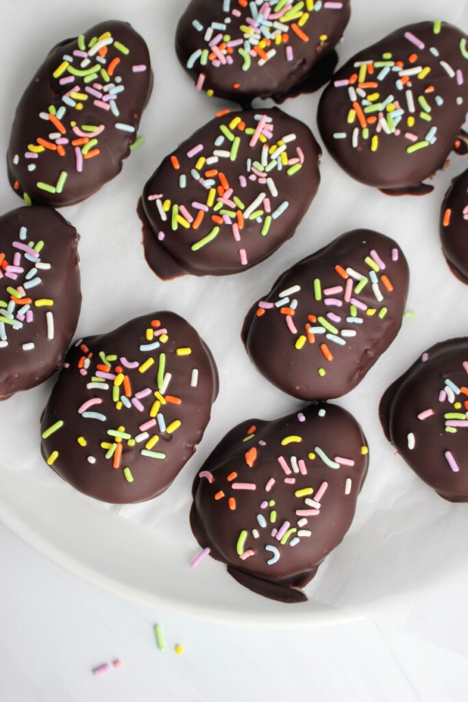 The Copycat Healthy Peanut Butter Eggs are on a plate and are ready to enjoy.