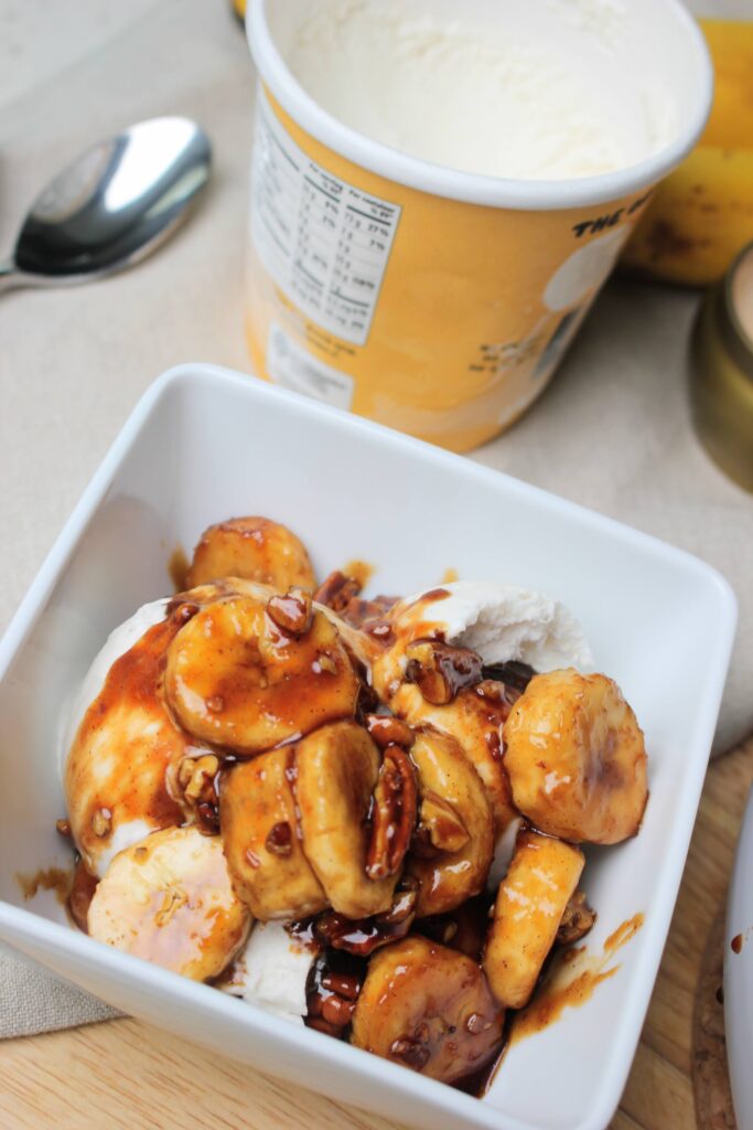 Banana fosters topped over oat milk-based ice cream.