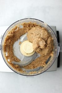 The cashew butter, maple syrup and water have been blended into the dough.