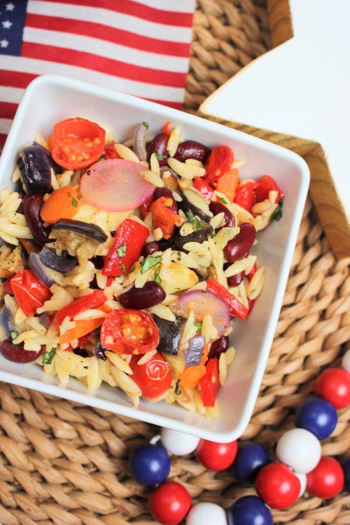 This vegan pasta salad is the perfect side dish for a backyard BBQ or 4th of July event.