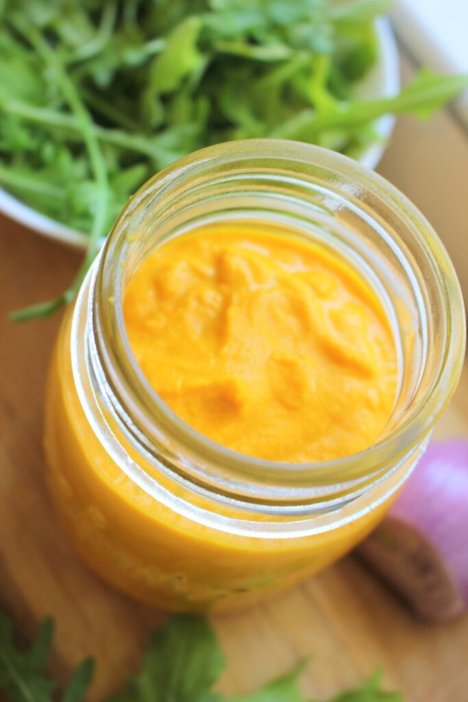 Ultimate Easy Japanese Carrot Ginger Dressing is ready to eat in a mason jar.