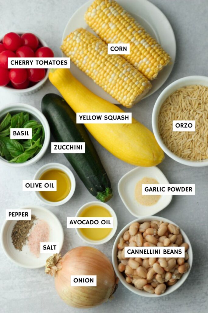 All of the ingredients needed to make this vegan orzo salad.