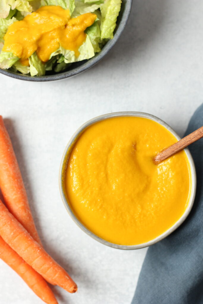 A bowl of Japanese Carrot Ginger Dressing.