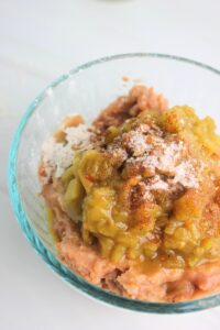 Mixing the beans and seasonings in a bowl.