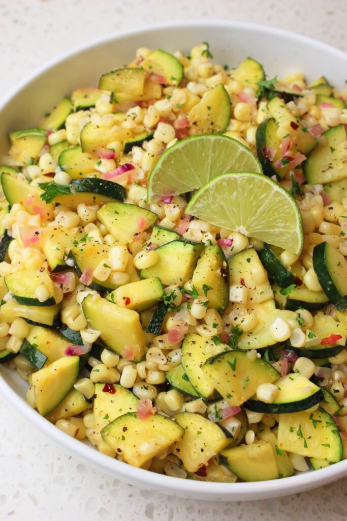 Just finished plating the simple side dish into a bowl with lime wedges over top.