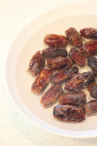 A bowl of soaked dates.