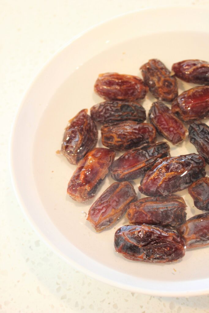 A bowl of soaked dates.