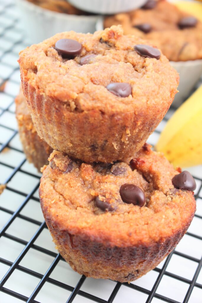 One-bowl banana coconut muffins stacked.