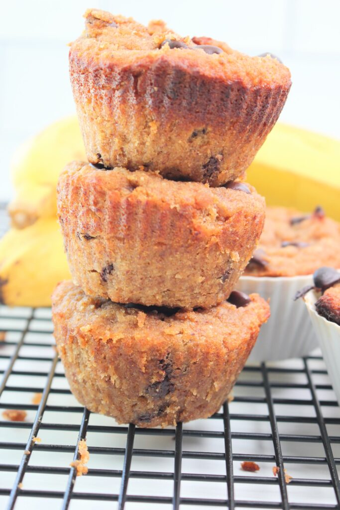 Three muffins stacked high.