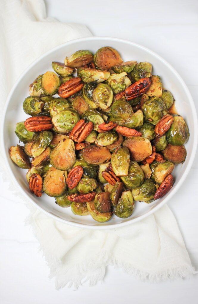 A bowl of sweet and spicy balsamic glazed brussels sprouts.