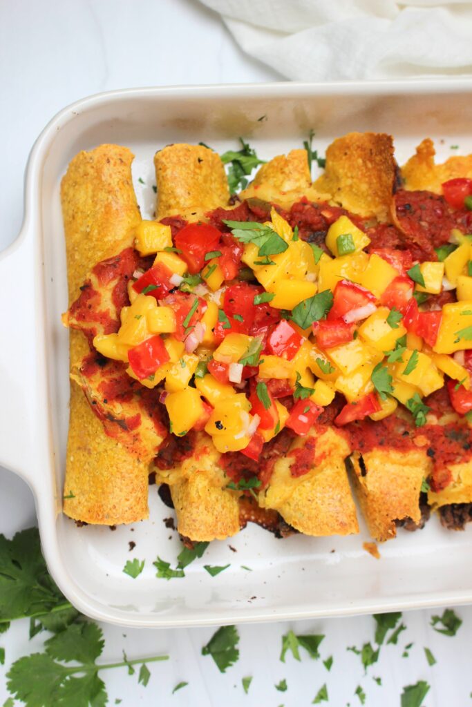 Just added the fresh mango salsa to the taquitos.
