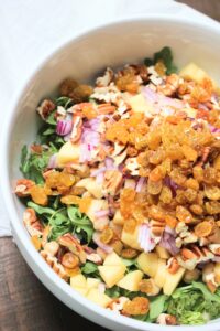 Just added all of the salad ingredients into the bowl. 
