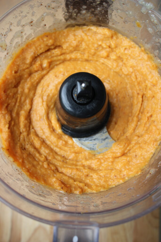 The blended wet ingredients in the food processor.