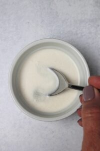 Preparing the milk and vinegar mixture.