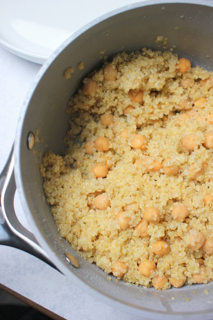 The cooked quinoa in a pot.