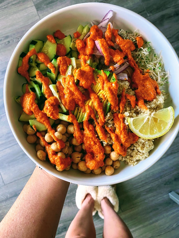 Holding this vegan power bowl and ready to eat.