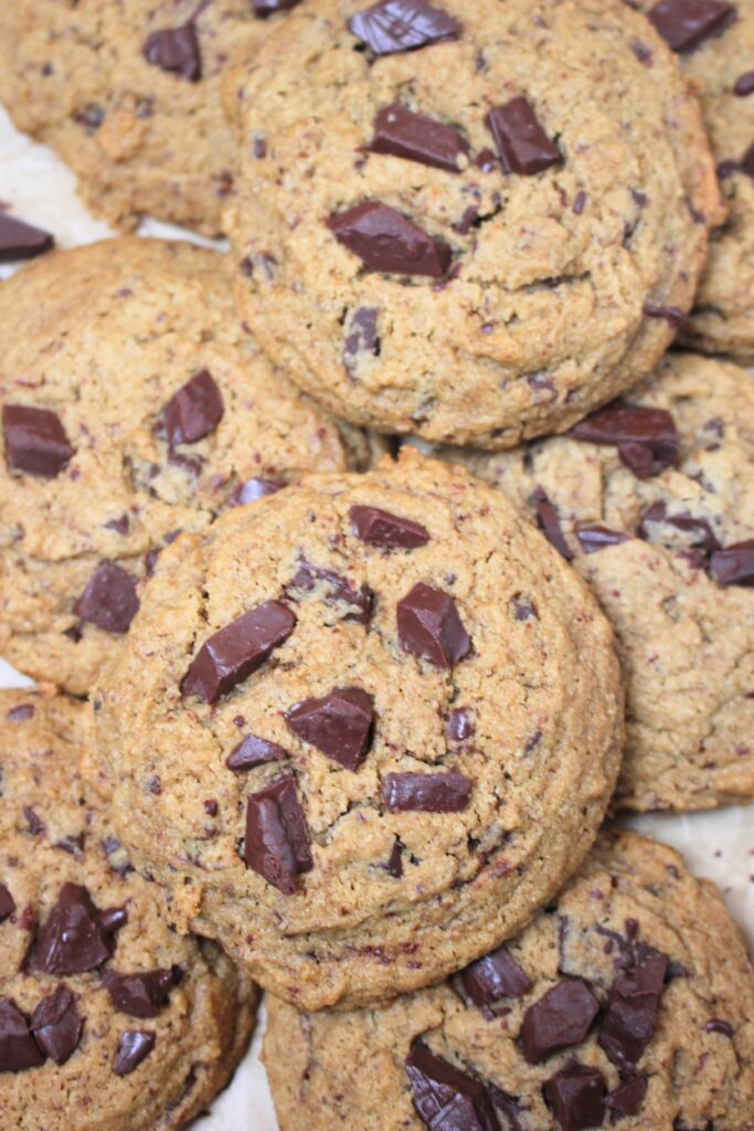 Up close picture of vegan soft baked chocolate chip cookies. 