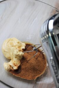 The coconut sugar and vegan butter are in the bowl and ready to get mixed.