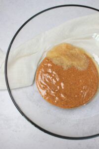 The wet ingredients in a glass bowl.