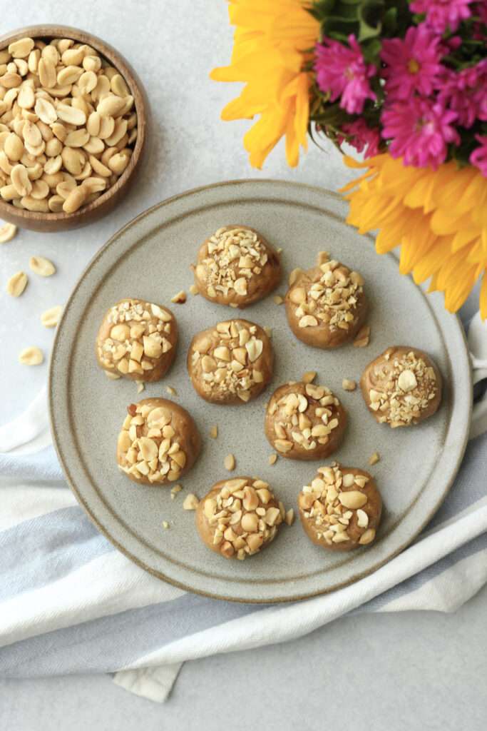 The peanut butter poppers are on a plate.