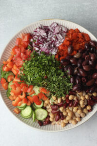 All of the ingredients have been added to a large bowl.