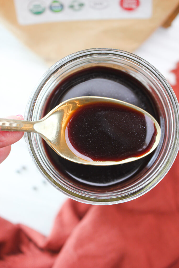 A spoonful of elderberry syrup.