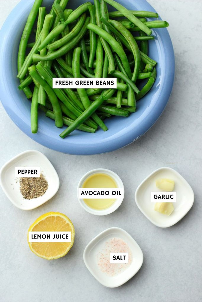 All of the ingredients needed to make these sauteed green beans with garlic and lemon.