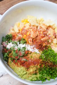 All of the ingredients in a large bowl ready to be mixed.