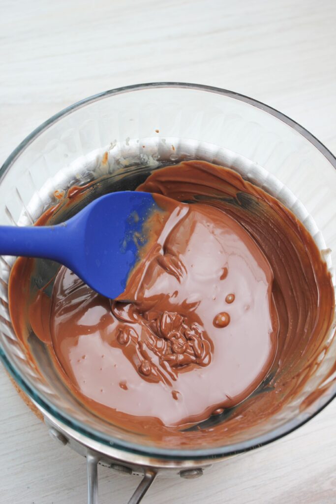 Mixing the melted ganache.