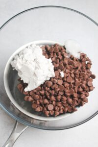 Melting the chocolate using a double boiler.