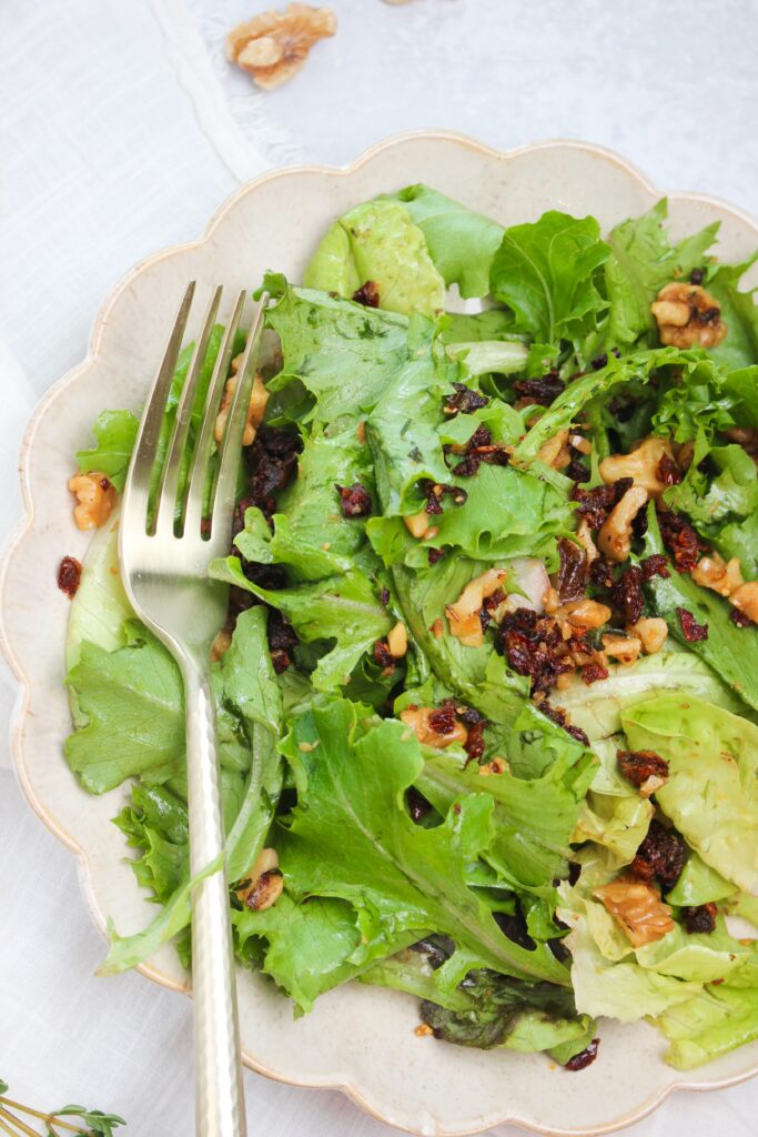 A single serving of this baby greens salad.