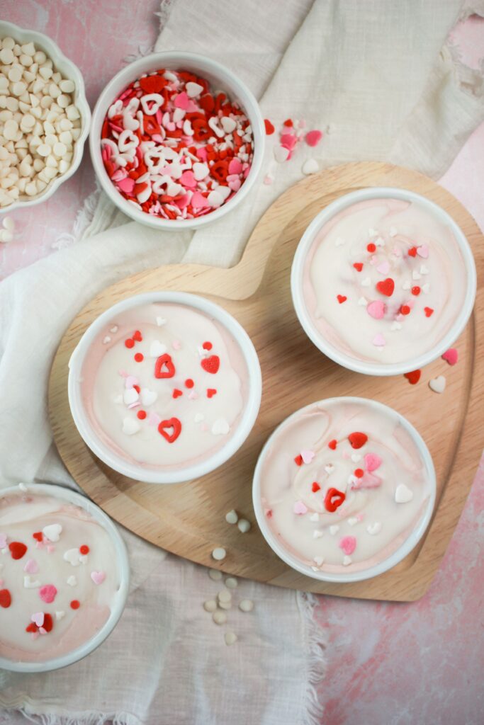 The parfaits just came out of the fridge and are ready to enjoy in four individual ramekins.