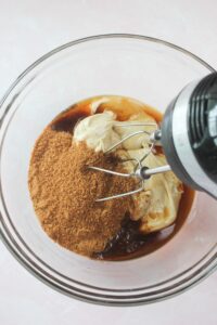 Mixing the wet sugar ingredients in a large bowl.