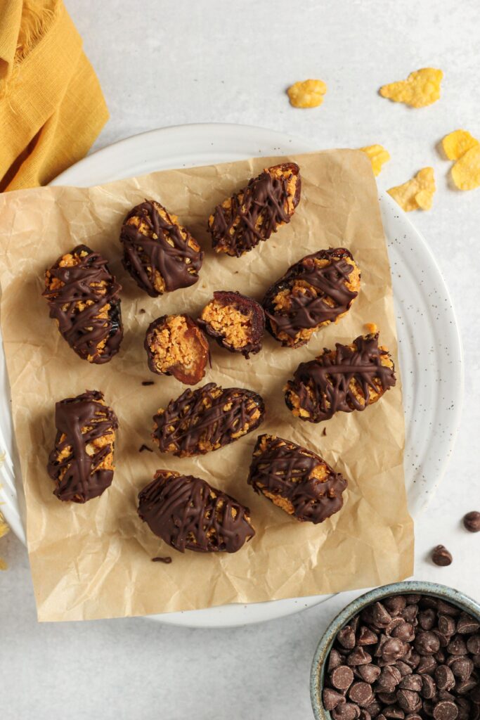 A plate of these vegan Butterfinger-Inspired Dates.