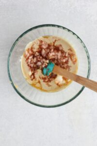 All of the ingredients for the dipping sauce are in a bowl and are ready to be stirred.