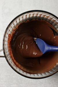 The melted chocolate in a small saucepan.